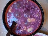 黑糯米芝麻馅汤圆煮紫薯甜酒鸡蛋